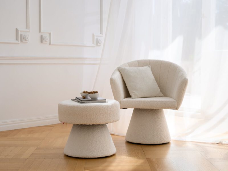 Armchair and table from the Essenza Boucle collection