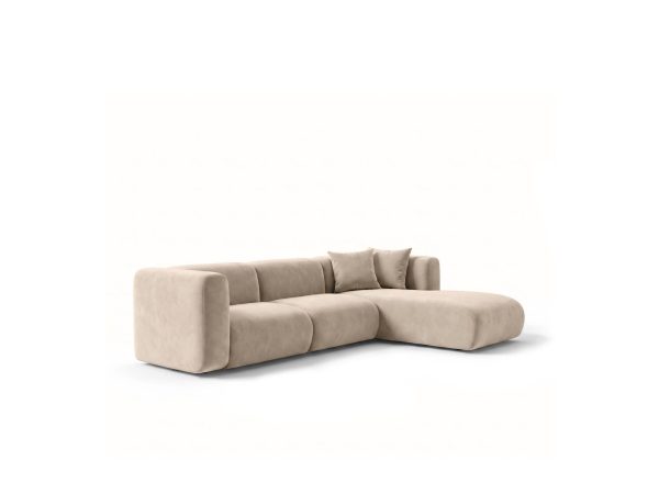 Modułowa sofa narożna prawostronna SORISSO w odcieniu jasnego beżu, urządzona w minimalistycznym stylu.